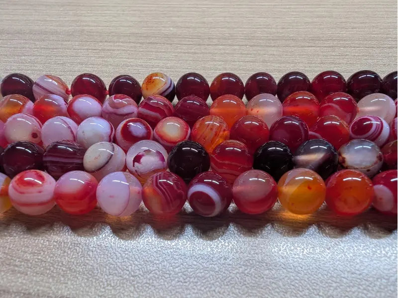 Agate rayée rouge Grade A - 8 mm - 20/40 Perles Les Précieuses Perles