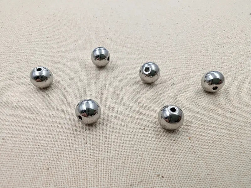 Perles rondes 8 mm en acier inoxydable 304 – Trou 1,5 mm – Lot de 20 Les Précieuses Perles