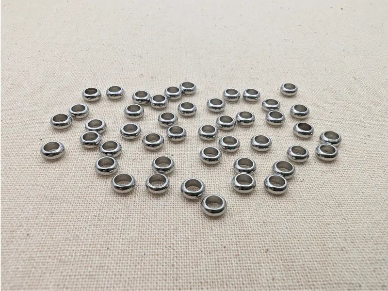 Perles intercalaires 5 x 2 mm en acier inoxydable 304 – Trou 3 mm – Lot de 50 ou 100 Les Précieuses Perles