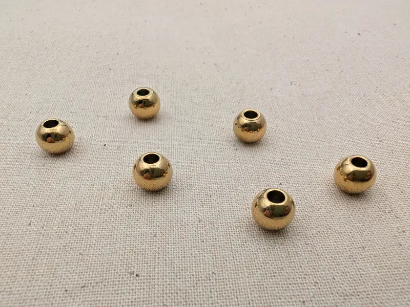 Perles rondes 8 mm acier inoxydable plaqué or 18K – Trou 3 mm – Lot de 10 ou 20 Les Précieuses Perles