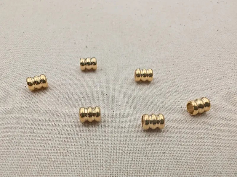 Perle tube rainurée 6 x 5 mm – Acier inoxydable 304 dorée – Trou 3,3 mm - lot de 10 Les Précieuses Perles