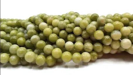 Le Péridot et ses vertus en Lithothérapie - Les Précieuses Perles - AXELLECREATIONS