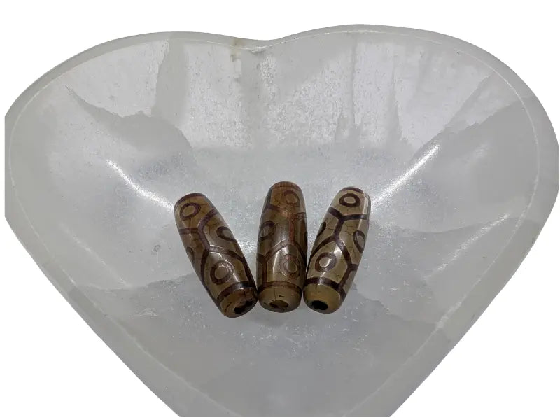 Perle DZI Tibétaine 9 yeux Les Précieuses Perles