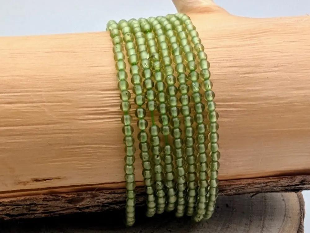 Péridot Grade A - 3 mm - Perles rondes - fil de 39 cm Les Précieuses Perles