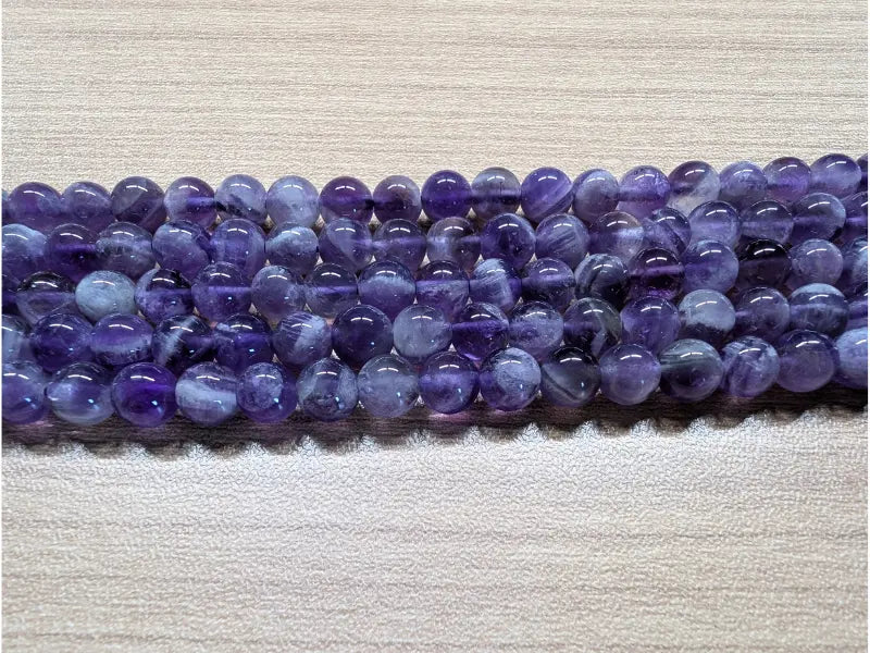 Améthyste rubanée - 6 mm - 30/60 Perles Les Précieuses Perles