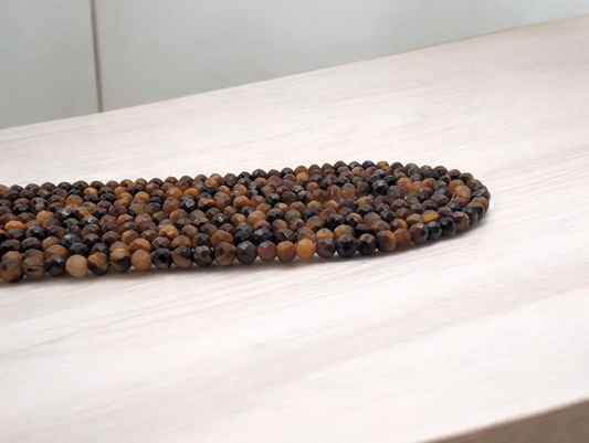 Œil de tigre - 3 mm - Perles à facettes - Fil de 39 cm Les Précieuses Perles