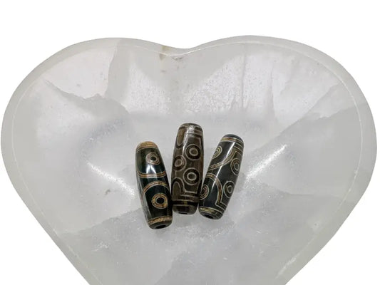 Perle DZI Tibétaine 7 yeux Les Précieuses Perles