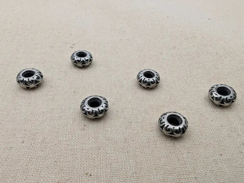 Perle intercalaire gravée 9 x 4 mm – Acier inoxydable 304 – Trou 3 mm Les Précieuses Perles