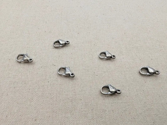Fermoir mousqueton 12 x 8 mm – Acier inoxydable 304 – Lot de 20 Les Précieuses Perles