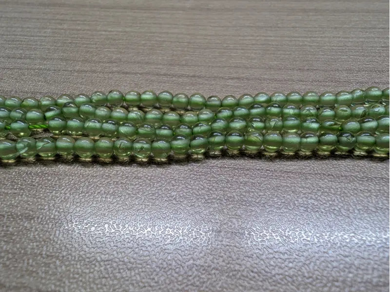 Péridot Grade A - 3 mm - Perles rondes - fil de 39 cm Les Précieuses Perles