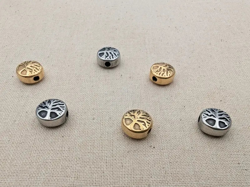 Perle décorative inox arbre de vie - 10 x 5,5 mm Les Précieuses Perles