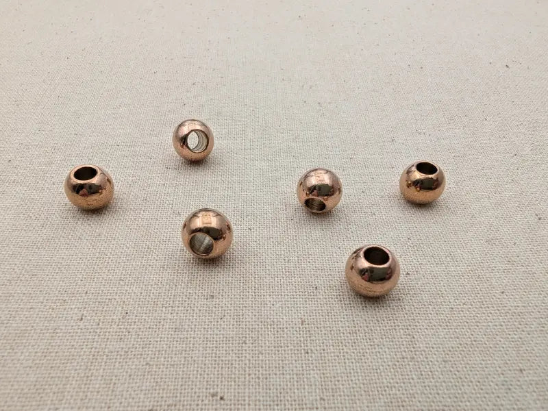 Perles rondes 8 mm en acier inoxydable 304 or rose – Placage ionique – Trou 3,5 mm – Lot de 5 ou 10 Les Précieuses Perles