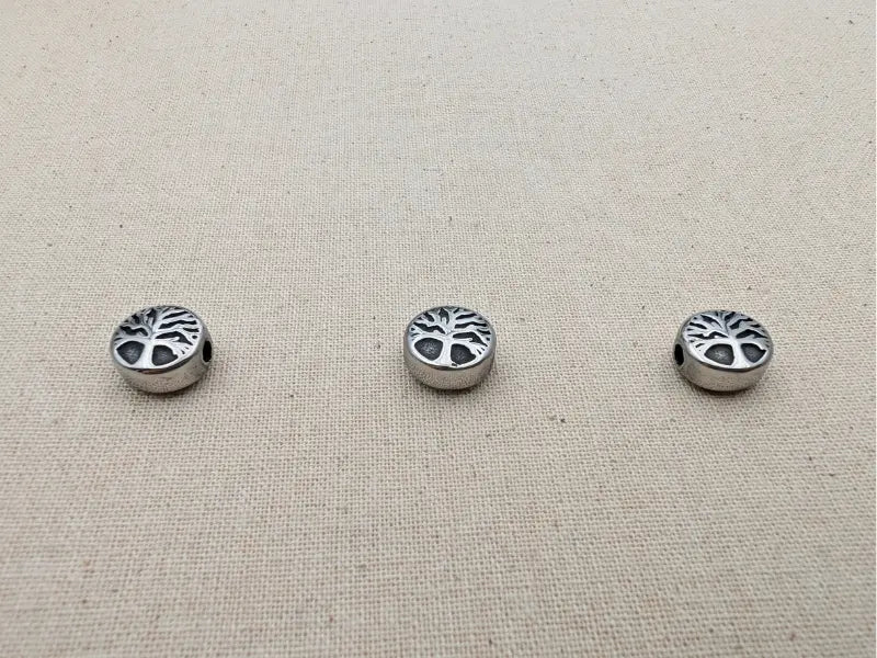 Perle décorative inox arbre de vie - 10 x 5,5 mm Les Précieuses Perles