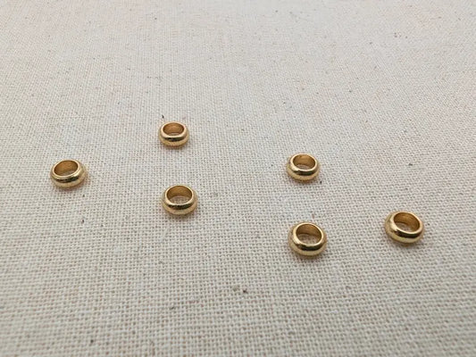 Perles intercalaires rondelles 5 mm acier inoxydable 304 doré - Lot de 10 ou 20 Les Précieuses Perles