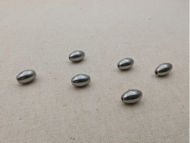Perles ovales 9x6 mm en acier inoxydable 304 – Trou 1,3 mm – Lot de 10 ou 20 Les Précieuses Perles