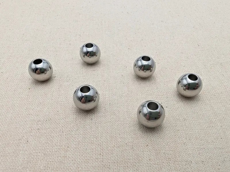 Perles rondes 10 mm trou 3,5 mm inox Les Précieuses Perles