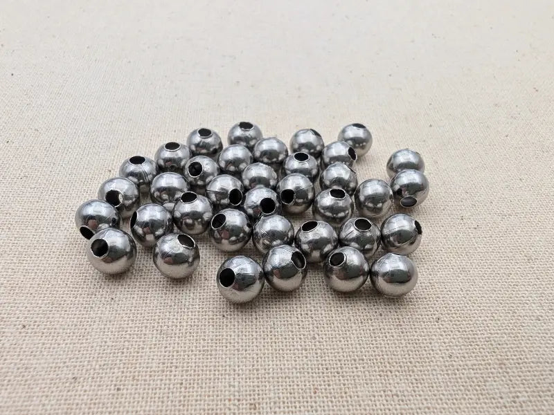 Perles creuses 6 mm en acier inoxydable 304 – Lot de 40 Les Précieuses Perles