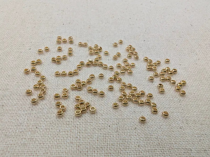 Perles d’espacement 2 x 1 mm acier inoxydable 304 plaqué or 24K – Lot de 500 Les Précieuses Perles
