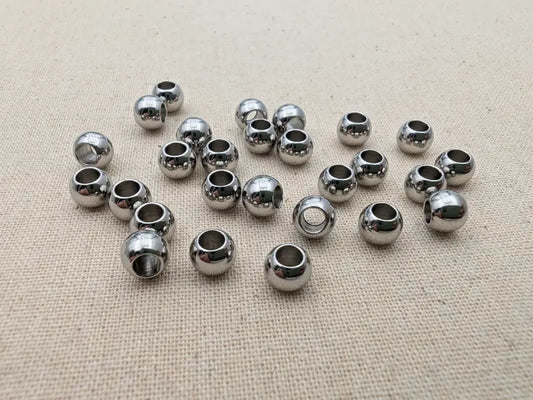 Perles intercalaires 6 x 4,5 mm – Acier inoxydable 201 – Trou 3 mm – Lot de 40 Les Précieuses Perles