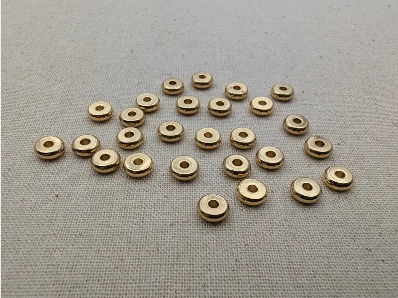 Rondelles séparateurs 6 x 2 mm inox plaqué or 24 k - 20/40 Perles Les Précieuses Perles