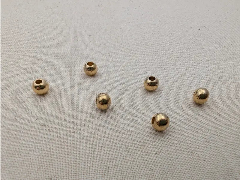 Perle ronde lisse 6x5 mm plaqué or – Acier inoxydable – Lot de 10, 20 ou 40 Les Précieuses Perles