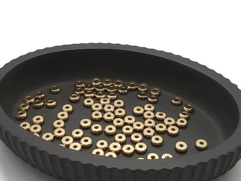 Rondelles séparateurs 6 x 2 mm inox plaqué or 24 k - 20/40 Perles Les Précieuses Perles