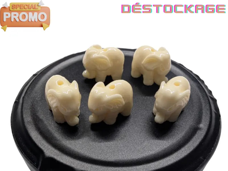 Corail blanc synthétique - Éléphants 10 mm - Lot de 5/10 Les Précieuses Perles
