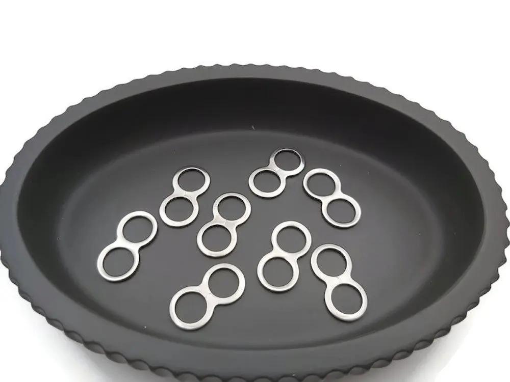 Connecteur signe infini inox - Lot de 20 Les Précieuses Perles