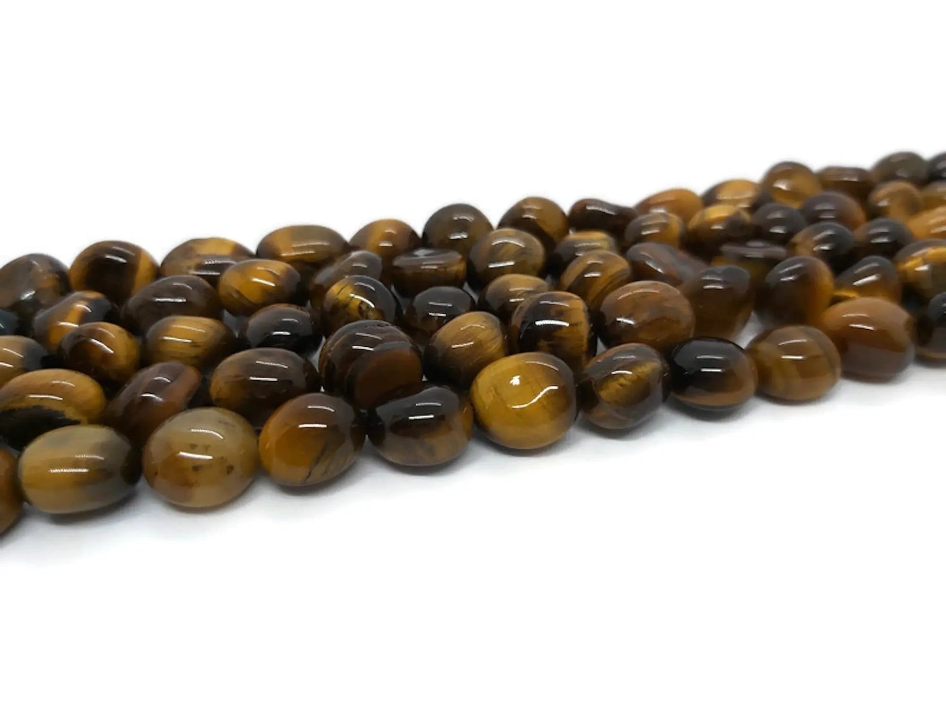 Œil de tigre - Pépites percées de 8-12 mm Les Précieuses Perles