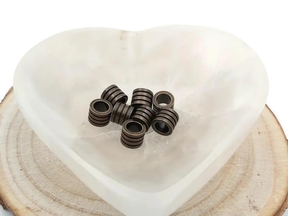 Perle décorative inox couleur bronze - 10 x 8 mm Les Précieuses Perles