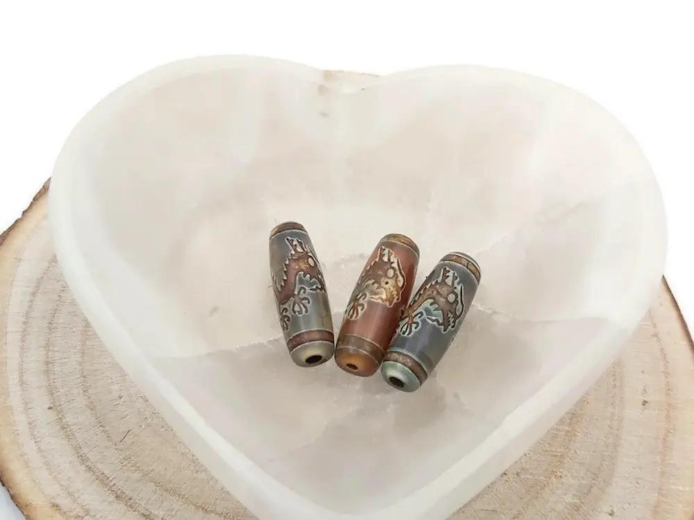 Agate - DZI Tibétaine modèle dragon Les Précieuses Perles