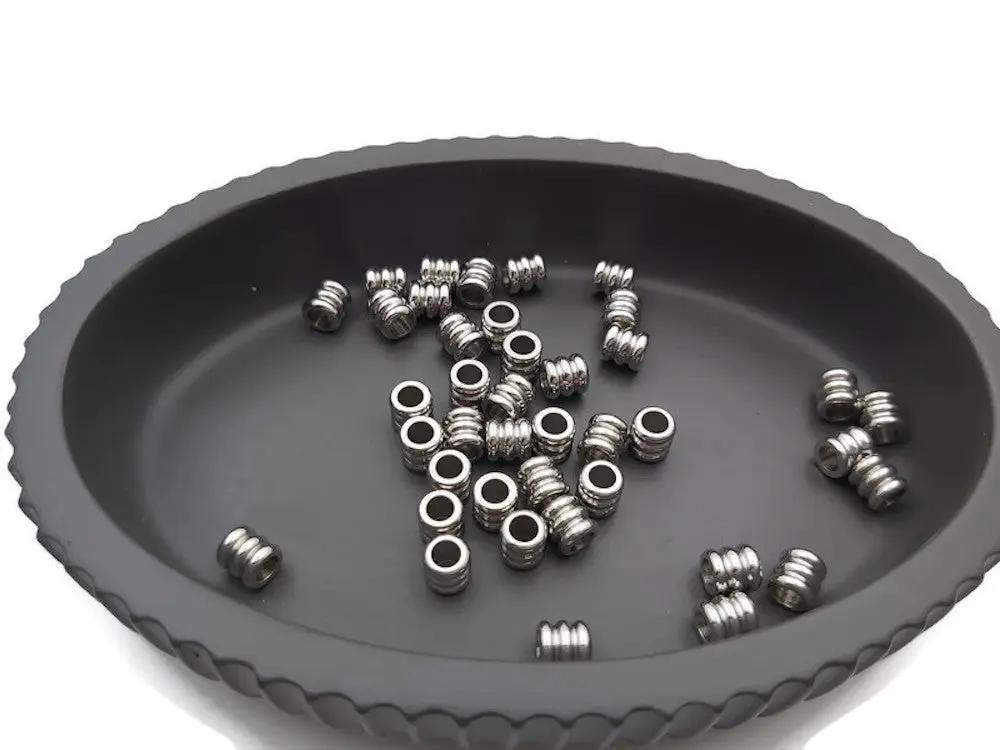 Perles colonnes inox - 6,5 x 5,2 mm - Lot de 10/20 Les Précieuses Perles