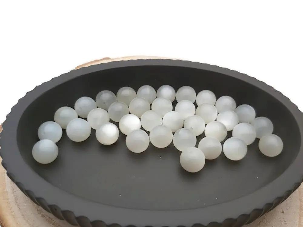 Pierre de lune  Grade AA - 10 mm - 1/4 Perles Les Précieuses Perles