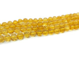Ambre naturel - irrégulier 6 mm (Trou 0,5mm )- 3/6 Perles