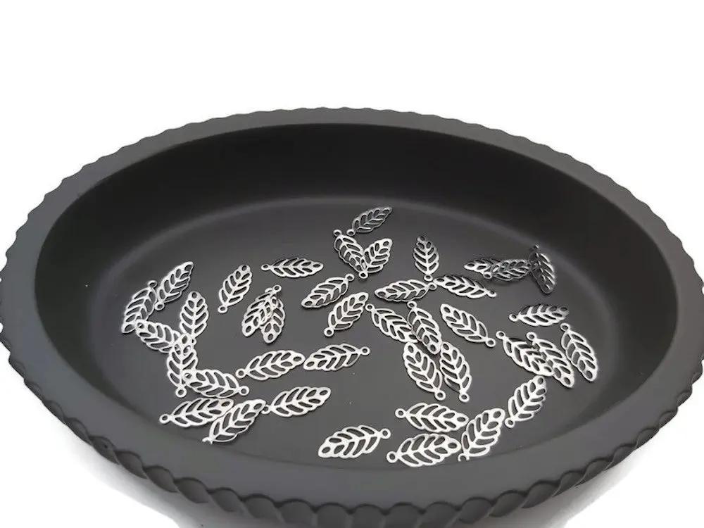 Breloque feuille ajourée inox - Lot de 20/40 Les Précieuses Perles