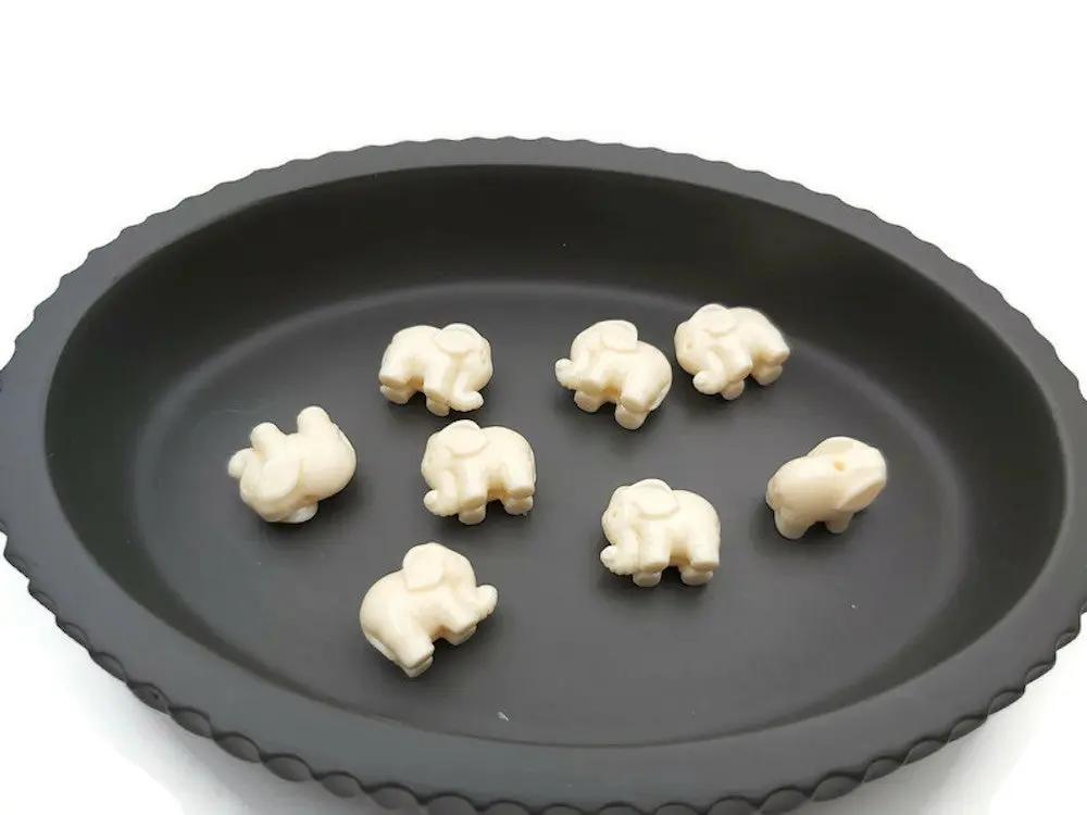 Corail blanc synthétique - Éléphants 10 mm - Lot de 5/10 Les Précieuses Perles