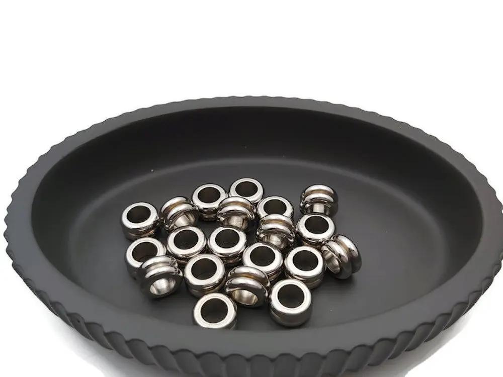 Perles rondelles 11 x 6 mm inox - Lot de 5/10 Les Précieuses Perles