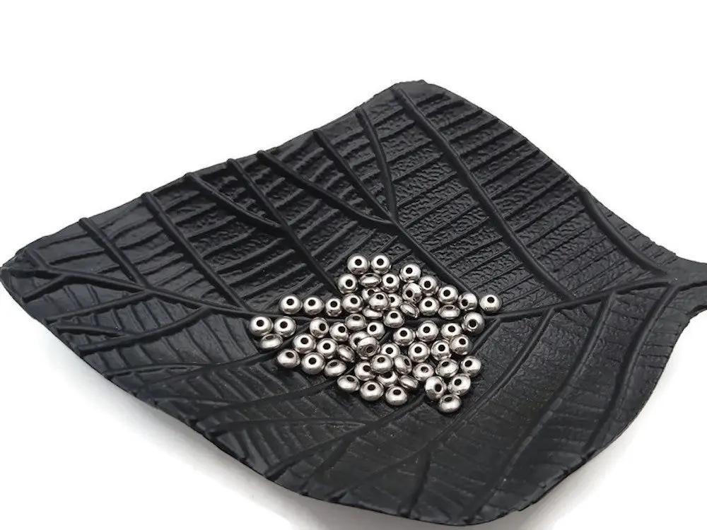 Perles rondelles 5 x 2,5 mm inox - Lot de 20/40 Les Précieuses Perles